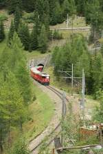 The Ge 4/4 II with a St.Moritz - Chur service between Preda and Bergün.