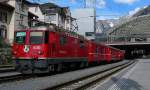 Ge 4/4 II 630 with a RE to Disentis leaves Chur.