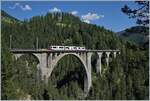 The RhB ABe 8/12 3512  Allegra  on the Wiesner Viaduct by Wiesen.