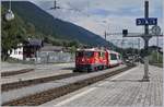 Change of the locomotives by the Glacier Express in Disentis: The Rhb Ge 4/4 II 629 is arriving wiht his Glacier Express from St Moritz to Zermatt in Disenstis.