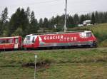 Ge 4/4 III no 651  Glacier Express  at Bergn, August 29th, 2009.