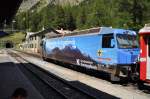 Ge 4/4 III no 647  Swisscanto Anlagefonds  at Spinas in front of the tunnel Albula, August 19th, 2009.