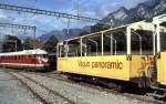 VT 08 520 and RhB open summer wagons at Chur, August 30th, 1999.