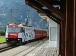 On the way to Davos: RhB Ge 4/4 III with his RE on the Malans Station.