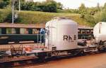 Rhaetian Railway - Air Activated Tank (Covered Hopper) wagon for dry products Uce 8028 in station Filisur, August 1987