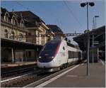 The SNCF InOui TGV 4404 runs for Lyria in Lausanne.