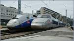 A TGV Lyria and a TGV Duplex in the Paris Lion Station.