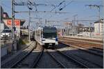 The TL Be 4/6 218 (Be 558 218-1) and Bem 4/6 207 (Bem 558 207-7) are arriving at The Renens VD Station. 

10.03.2022 
