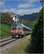 A SBB Domino is arriving at Locarno.