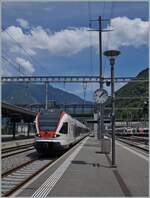 A SBB TILO RABe 524 is arriving at Bellinzona.