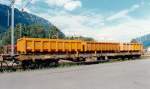 SBB-CFF Flat Wagon Slps-x used for hauling Roll-off Containers (ACTS Containers), near station Interlaken-Ost (CH), August 1996