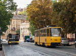 30.08.2024. The Tatra KT4SU tram No 1126 (route 7) on the Lychakivs`ka Street. Nearby you can see an Electron city bus, which is manufactured in Lviv.