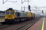 Freightliner Poland 66602 hauls an engineering machine through Rzepin on a grey morning of 3 May 2018.