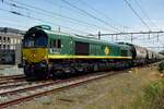 Freightliner 266 004/DE 676 hauls a cereals train out of Oss on 16 June 2021.