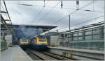 A Midland HST 125 is leaving St Pancras.