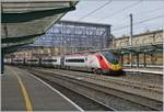 The Virgin Pendolino 390 112 by his stop in Carlisle.