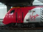 Side view of a Virgin Trains DMU.