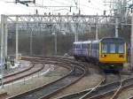 Northern DMU 142 011 arriving at Liverpool South Parkway Station, 11.3.2015