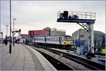 The Wales&West (by National Express) Class 143 in the Regional Railways coulors is arriving at the Cardiff Central / Caerdydd Canolog     Analog picture rom the Nov.