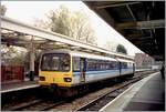 The Wales&West (by National Express) 143623 in the Regional Railways coulors in Cardiff Queen Street / Caerdydd Heol y Frenhines.