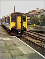 The Wales&West (by National Express) 150 279 in the Regional Railways coulors  on the way to Penarth is arriving at the Cardiff Queen Street / Caerdydd Heol y Frenhines. 

Analog picture rom the Nov. 2000