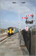 The 150 229 to St Ives is leaving St Erth Station.