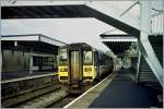 The local train 153 374 in Tenby.