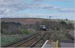 A ScottRail Class 170 from Aberdeeen ot Glasgow is approching Sonehaven.