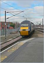 A GNER Class 43 HST 125 is leaving York.