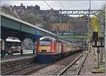 A Virgin East Coast HST 125 Class 43 to Abedeen is leaving Edinburhg Waverley.