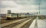 A  First  HST from London is leaving Cardiff to Abertawe.