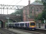 Northern Rail train 323225 in Heaton Chapel. One of the nexts stops is Manchester Picadilly. Aug. 2006