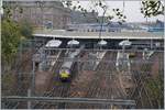 A ScotRail Class 334 is arriving at Edinburg Waverley.