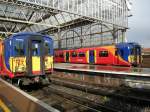 colored custumert South West Trains wait in London Waterloo for the departer time 