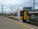 This electric multiples units train in ashford take the current from a electric rail and not form the electric line - The electric line is only for the Eurostar service.