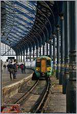 The Southern 377 132 is arriving at Brighton.