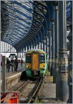 The 377 132 from London Victoira is arriving at Brighton.
