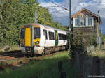 King's Lynn, Great Northern EMU No. 387 115, with the 14,44 train from King's Cross, at Tennyson Road crossing, Kings Lynn Junction Signalbox.
13th of September 2017