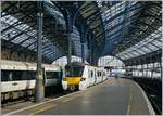 The Thames Links 170 138 is arriving at Brighton.