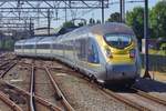 EuroStar 4013 quits Amsterdam Centraal for the journey to London via Bruxelles-Midi and Lille on 5 July 2018. 