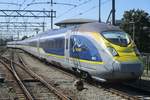 EuroStar 4013 quits Amsterdam Centraal for the journey to London via Bruxelles-Midi and Lille on 5 July 2018. 
