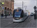 A Edinburg Tram in the St Anddrew Street on the way to the Airport.