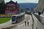 Tram coming from the Standard stop goes along the Lige Guillemins station. Oct. 2025