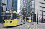 Manchester Metrolink Trams 3072 and 3111 (Bombardier M 5000) crossing Aytoun Street. Date: 11. march 2018.