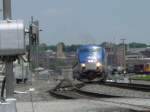 Amtrak 189 entering the switch to put it back on the eastbound track in the yard at Burlington, Iowa.