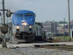 Amtrak 177 pulls its train from the westbound track onto the eastbound track at the South Street crossing in Burlington, Iowa.