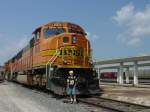 No. 10 Brenden Maxwell stands in front of BNSF No. 8909 on 30 July 2003 at the Burlington, Iowa depot.