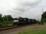 An NS train pass bound brook with a Classiac SD60 trailing.
