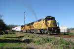 The Union Pacific engines 9230 and 4943 with a mixed freight train in Spring (near Houston, Texas).