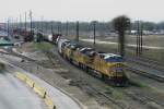 A freight train of the Union Pacific with three engines of different types is arriving in a yard in Houston Texas. The first one is a “C45ACCTE” with the number 5511, the second one is a “SD70ACe” (8358) and the third one  is a “SD70M” and has the number 4462. 16.03.2008.